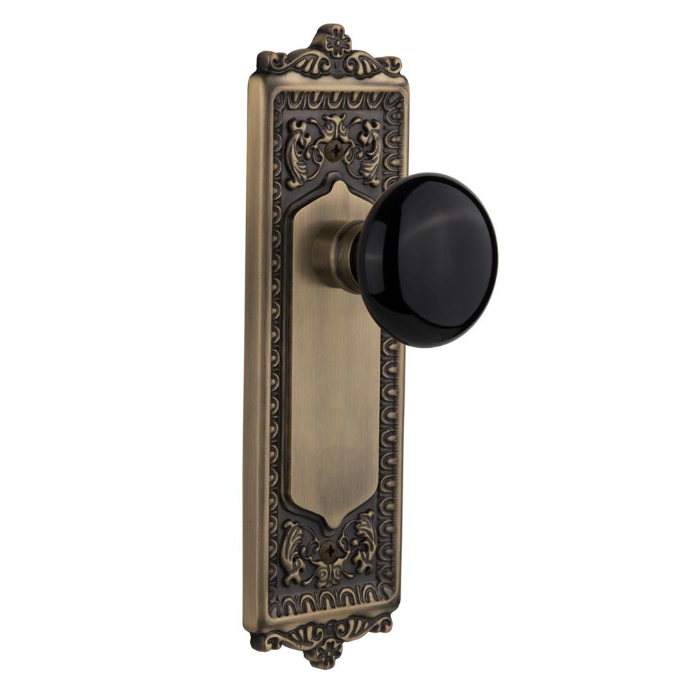 Nostalgic Warehouse EADBLK Privacy Knob Egg and Dart Plate with Black Porcelain Knob without Keyhole in Antique Brass